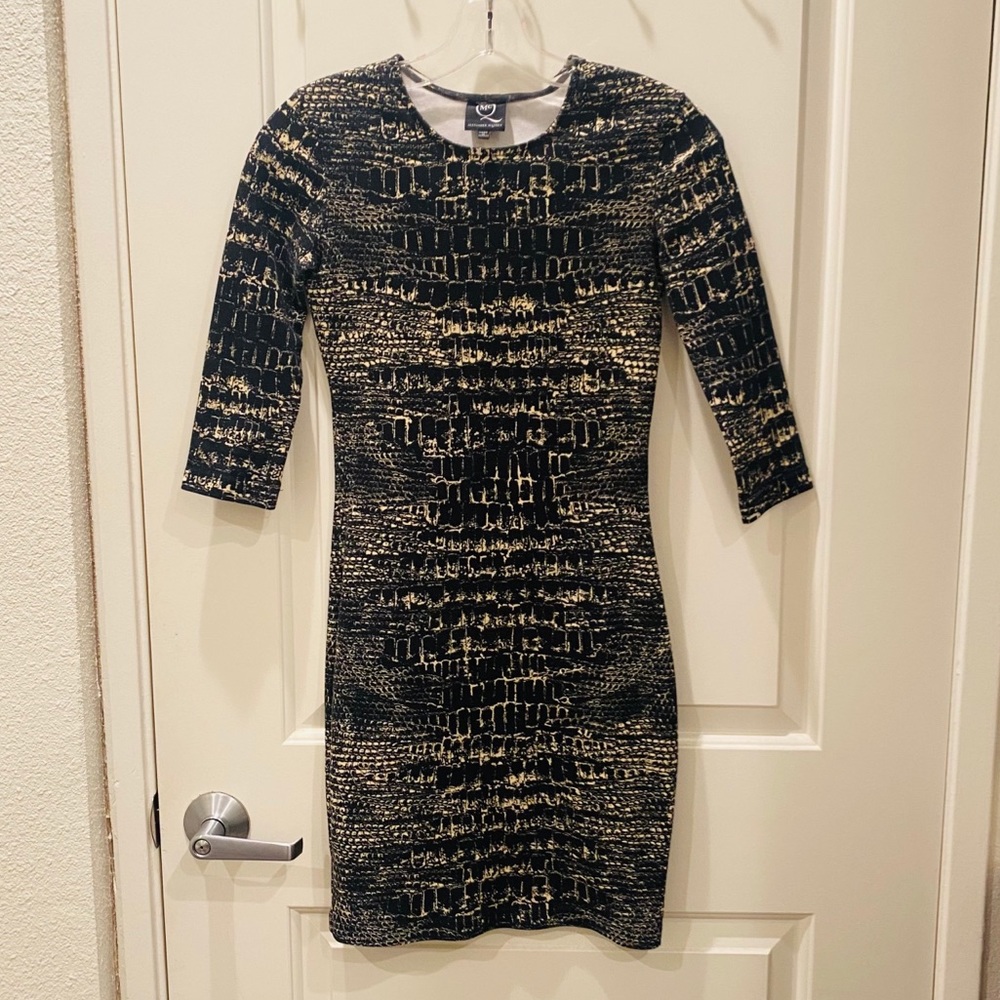 Alexander McQueen bodycon snake print dress.
